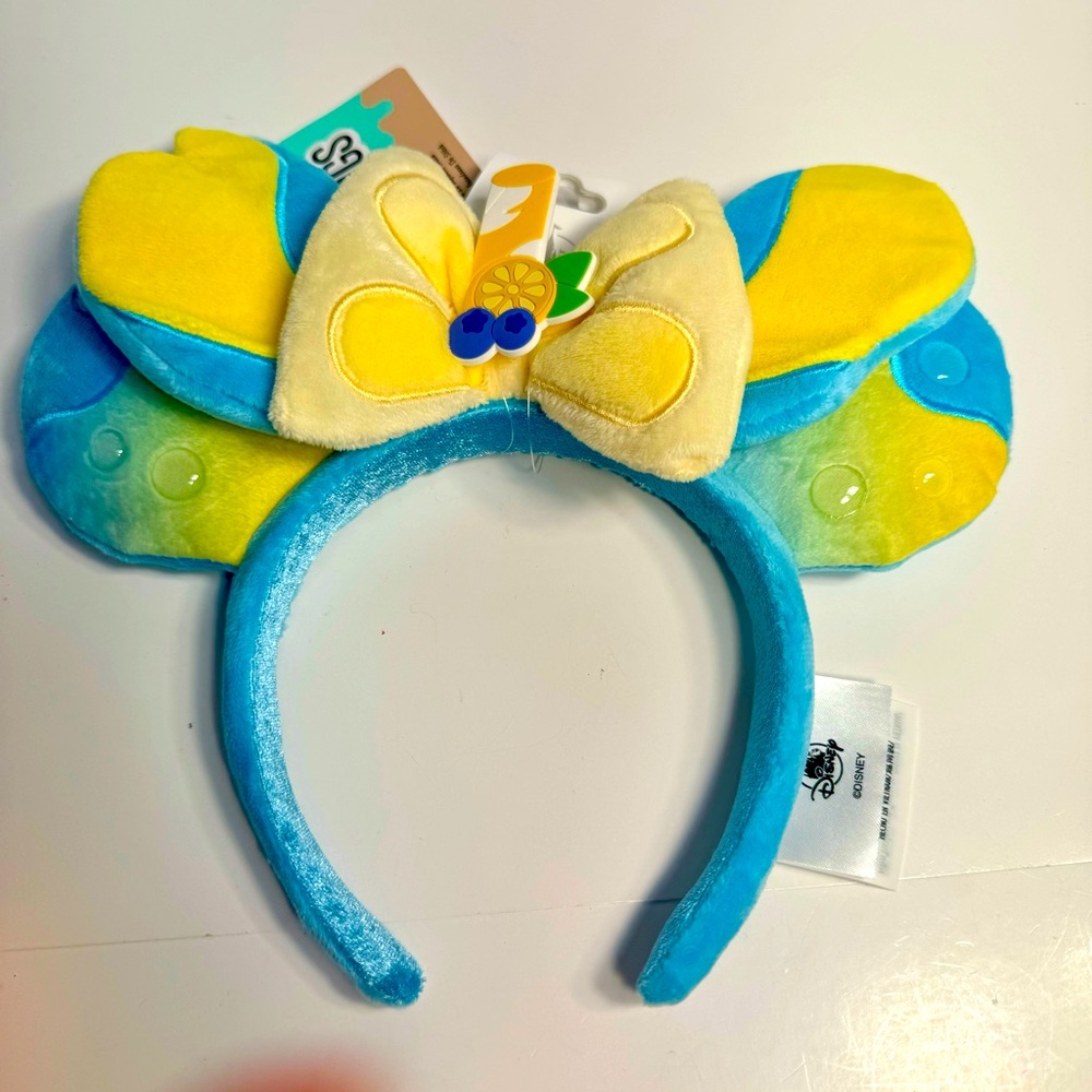 NWT. Disney Parks Stitch Blueberry Lemonade Munchlings Ears Headband.